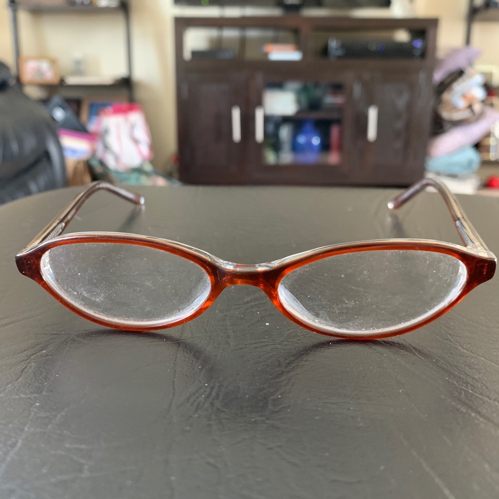 Cute, brown oval glasses.